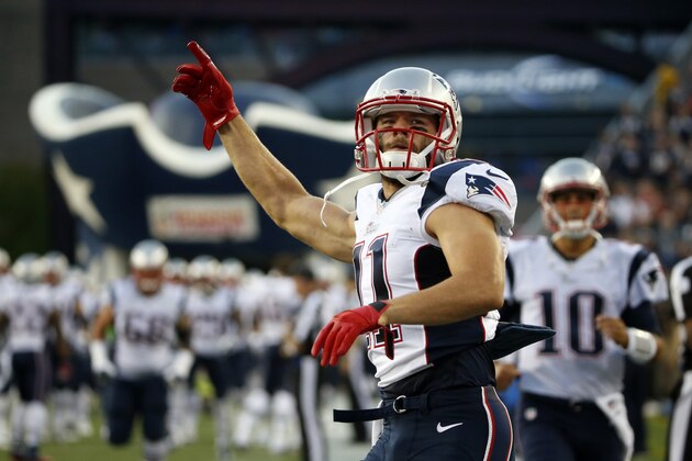 New England Patriots wide receiver Julian Edelman warms up before an NFL preseason football game against the Philadelphia Eagles Friday, Aug. 15, 2014, in Foxborough, Mass. (AP Photo/Elise Amendola)