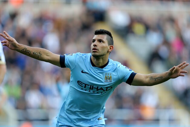 Manchester City's Sergio Aguero celebrates his goal  during their English Premier League soccer match against Newcastle United at St James' Park, Newcastle, England, Sunday, Aug. 17, 2014. (AP Photo/Scott Heppell)