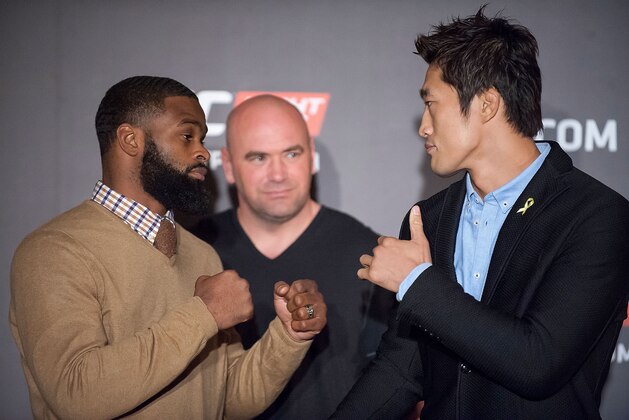 HONG KONG - AUGUST 20:  Tyron Woodley and Dong Hyun Kim at a face offs event during the Macao UFC Fight Night Press Conference at the Four Season Hotel on August 20, 2014 in Hong Kong.  (Photo by Anthony Kwan/Getty Images)