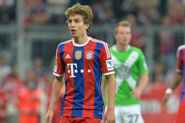 Bayern's Gianluca Gaudino walks through he pitchl during the  soccer match between FC Bayern Munich and VfL Wolfsburg in the Allianz Arena in Munich, Germany, on Friday, Aug. 22, 2014. (AP Photo/Kerstin Joensson)