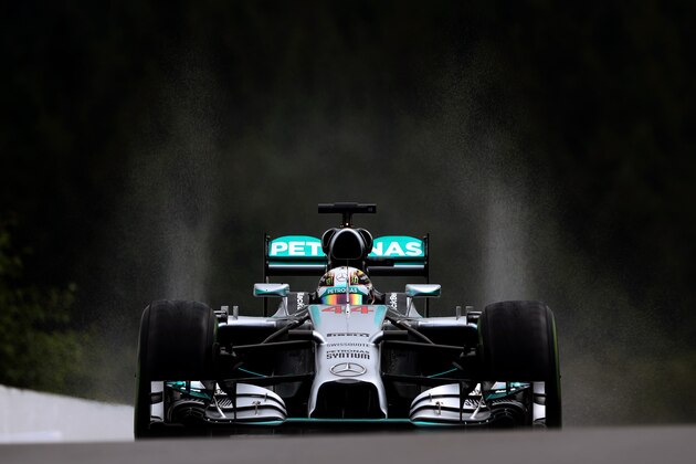 SPA, BELGIUM - AUGUST 23:  Lewis Hamilton of Great Britain and Mercedes GP drives during qualifying ahead of the Belgian Grand Prix at Circuit de Spa-Francorchamps on August 23, 2014 in Spa, Belgium.  (Photo by Mark Thompson/Getty Images)