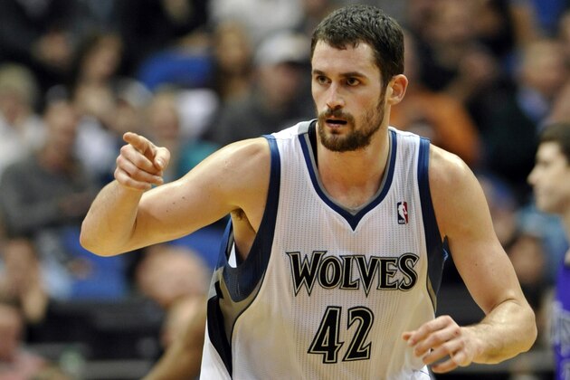 FILE - In this Jan. 16, 2012, file photo, Minnesota Timberwolves' Kevin Love reacts during the second half of an NBA basketball game against the Sacramento Kings in Minneapolis. The Timberwolves, Cleveland Cavaliers and Philadelphia 76ers completed a blockbuster trade sending Love to team up with LeBron James in Cleveland for 2014 No. 1 draft pick Andrew Wiggins on Saturday, Aug. 23, 2014, a person familiar with the trade said. The Timberwolves are getting Wiggins and former top pick Anthony Bennett from Cleveland and veteran forward Thaddeus Young from Philadelphia. The 76ers get a 2015 first-round draft choice from Cleveland, and guard Alexey Shved and forward Luc Mbah a Moute from Minnesota. (AP Photo/ Jim Mone, File)