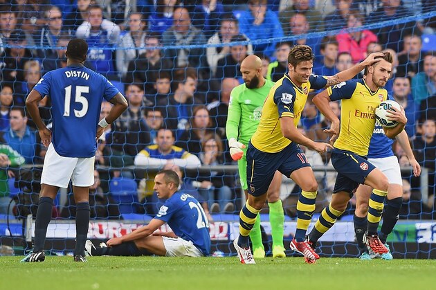 LIVERPOOL, ENGLAND - AUGUST 23:  Aaron Ramsey of Arsenal celebrates scoring his team's first goal during the Barclays Premier League match between Everton and Arsenal at Goodison Park on August 23, 2014 in Liverpool, England.  (Photo by Laurence Griffiths/Getty Images)