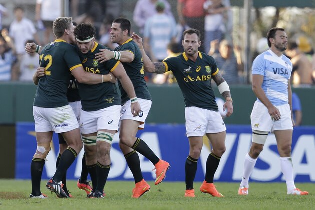 South Africa's players celebrate defeating Argentina in a Rugby Championship match in Salta, Argentina, Saturday, Aug. 23, 2014. (AP Photo/Victor R. Caivano)