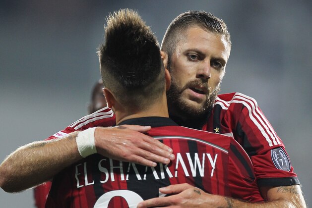 REGGIO NELL'EMILIA, ITALY - AUGUST 23:   Jeremy Menez with his teeammate Stephan El Shaarawy of AC Milan celebrates after scoring the opening goal  during the TIM Preseason Tournament between US Sassuolo, FC Juventus and AC Milan at Mapei Stadium - Citta' del Tricolore on August 23, 2014 in Reggio nell'Emilia, Italy.  (Photo by Paolo Bruno/Getty Images)