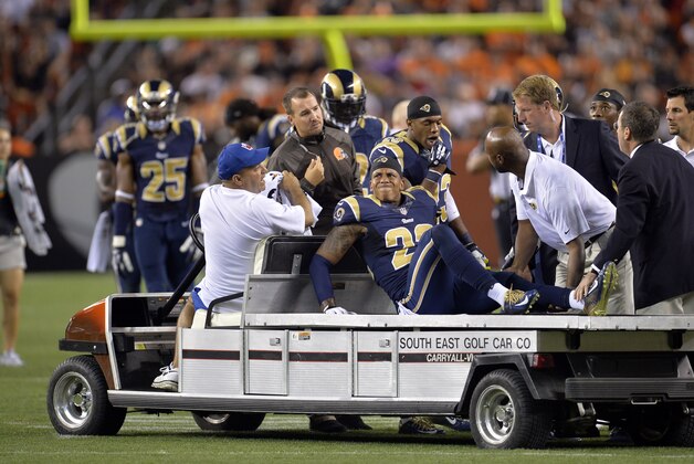 St. Louis Rams cornerback Trumaine Johnson (22) is taken off the field after an injury in the second quarter of a preseason NFL football game against the Cleveland Browns Saturday, Aug. 23, 2014, in Cleveland. (AP Photo/David Richard)
