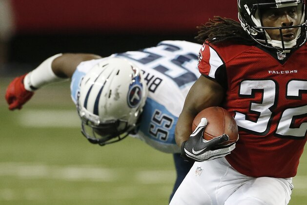 Atlanta Falcons running back Jacquizz Rodgers (32) runs past Tennessee Titans outside linebacker Zach Brown (55) during the first half of an NFL preseason football game, Saturday, Aug. 23, 2014, in Atlanta. (AP Photo/John Bazemore) Atlanta Falcons running back Jacquizz Rodgers (32) runs past Tennessee Titans outside linebacker Zach Brown (55) during the first half of an NFL preseason football game, Saturday, Aug. 23, 2014, in Atlanta. (AP Photo/John Bazemore)