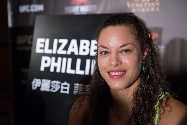 HONG KONG - AUGUST 20:  UFC women's bantamweight fighter Elizabeth Phillips at the Macao UFC Fight Night Press Conference at the Four Season Hotel on August 20, 2014 in Hong Kong.  (Photo by Anthony Kwan/Getty Images)