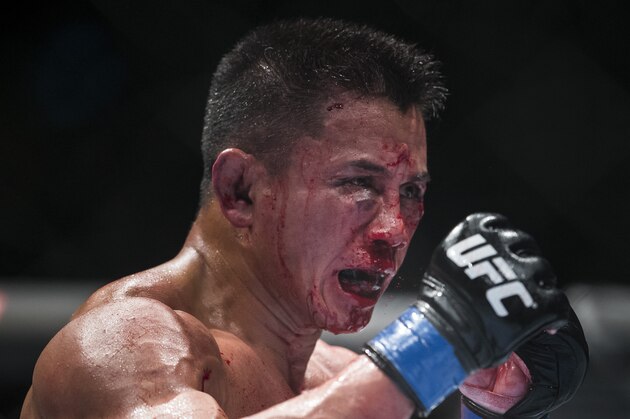 MACAU - AUGUST 23: Cung Le of USA bleeds on his 5-Round middleweight fight against Michael Bisping of England during the UFC Fight Night at The Venetian Macao Cotai Arena on August 23, 2014 in Macau, China. (Photo by Victor Fraile/Getty Images) MACAU - AUGUST 23: Cung Le of USA bleeds on his 5-Round middleweight fight against Michael Bisping of England during the UFC Fight Night at The Venetian Macao Cotai Arena on August 23, 2014 in Macau, China. (Photo by Victor Fraile/Getty Images)