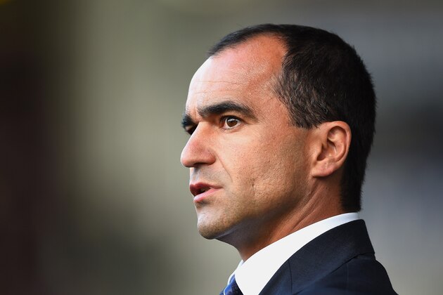 LIVERPOOL, ENGLAND - AUGUST 23:  Everton Manager Roberto Martinez looks on prior to the Barclays Premier League match between Everton and Arsenal at Goodison Park on August 23, 2014 in Liverpool, England.  (Photo by Laurence Griffiths/Getty Images)