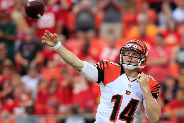 KANSAS CITY, MO - AUGUST 07:  Quarterback Andy Dalton #14 of the Cincinnati Bengals in action during the preseason game against the Kansas City Chiefs at Arrowhead Stadium on August 7, 2014 in Kansas City, Missouri.  (Photo by Jamie Squire/Getty Images)