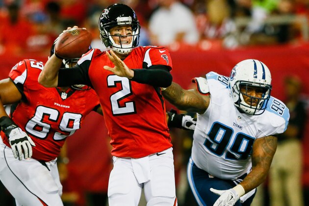 ATLANTA, GA - AUGUST 23: Matt Ryan #2 of the Atlanta Falcons throws a pass under pressure from Jurrell Casey #99 of the Tennessee Titans in the second half of a preseason game at the Georgia Dome on August 23, 2014 in Atlanta, Georgia.  (Photo by Kevin C. Cox/Getty Images)