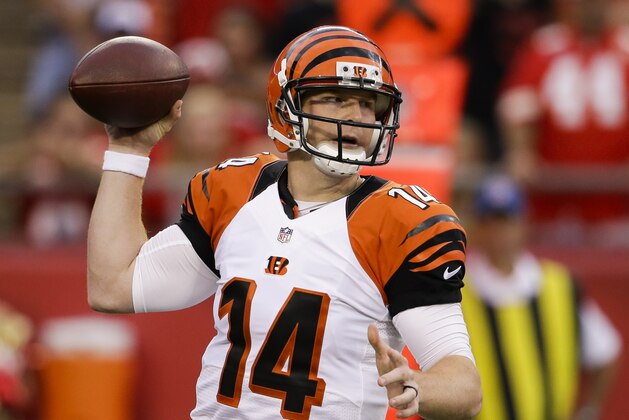 Cincinnati Bengals quarterback Andy Dalton looks for a receiver in the first half of an NFL preseason football game against the Kansas City Chiefs on Thursday, Aug. 7, 2014, in Kansas City, Mo. (AP Photo/Nati Harnik)