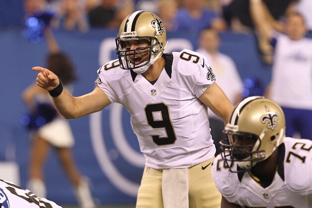 Aug 23, 2014; Indianapolis, IN, USA; New Orleans Saints quarterback Drew Brees (9) during the first quarter against the Indianapolis Colts at Lucas Oil Stadium. Mandatory Credit: Pat Lovell-USA TODAY Sports