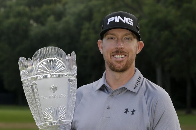 Hunter Mahan poses with the trophy after winning the The Barclays golf tournament Sunday, Aug. 24, 2014, in Paramus, N.J. Mahan won the tournament with a 14 under-par 270.   (AP Photo/Mel Evans)