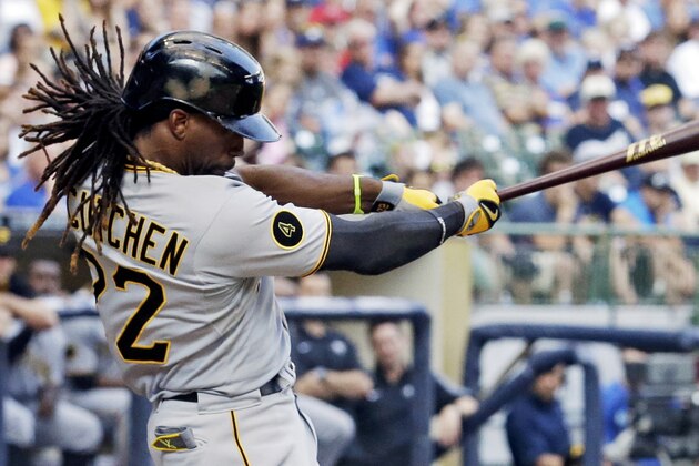 Pittsburgh Pirates' Andrew McCutchen hits a home run during the ninth inning of a baseball game against the Milwaukee Brewers, Sunday, Aug. 24, 2014, in Milwaukee. (AP Photo/Morry Gash)