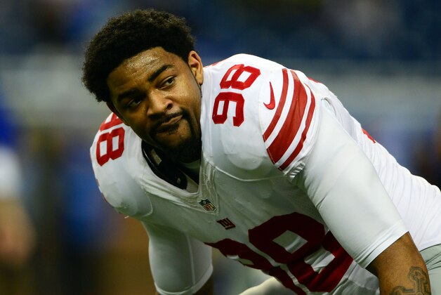 Dec 22, 2013; Detroit, MI, USA; New York Giants defensive end Damontre Moore (98) against the Detroit Lions at Ford Field. Mandatory Credit: Andrew Weber-USA TODAY Sports
