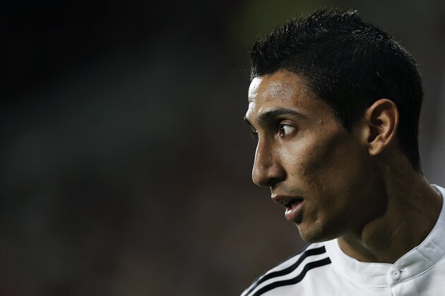 Real Madrid's Angel Di Maria from Argentina reacts during a Spanish Super Cup soccer match against Atletico Madrid at Santiago Bernabeu stadium in Madrid, Spain, Tuesday, Aug. 19, 2014 . (AP Photo/Daniel Ochoa de Olza) Real Madrid's Angel Di Maria from Argentina reacts during a Spanish Super Cup soccer match against Atletico Madrid at Santiago Bernabeu stadium in Madrid, Spain, Tuesday, Aug. 19, 2014 . (AP Photo/Daniel Ochoa de Olza)