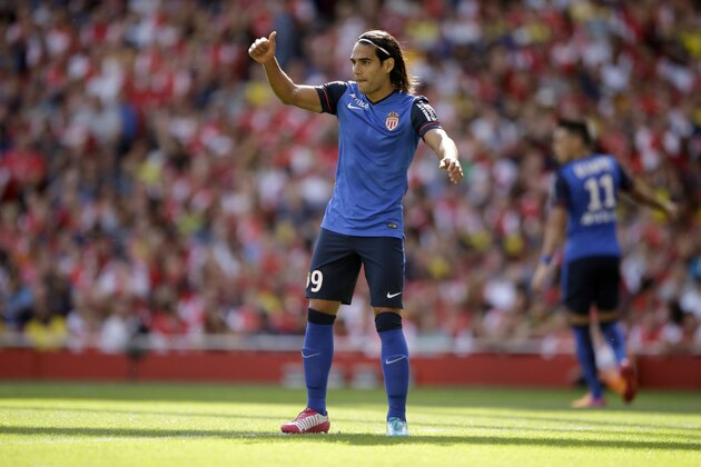 AS Monaco's Radamel Falcao gives a thumbs up during the Emirates Cup soccer match between Arsenal and AS Monaco at Arsenal's Emirates Stadium in London, Sunday, Aug. 3, 2014.  (AP Photo/Matt Dunham)