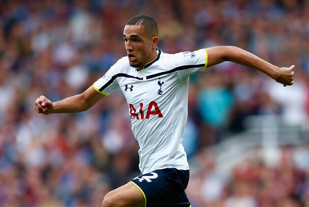 LONDON, ENGLAND - AUGUST 16:  Nabil Bentaleb of Spurs in action during the Premier League match between West Ham United and Tottenham Hotspur at Boleyn Ground on August 16, 2014 in London, England.  (Photo by Julian Finney/Getty Images)