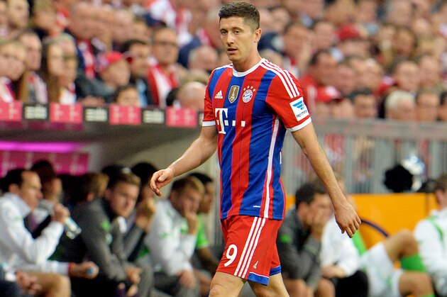 Bayern's Robert Lewandowski from Poland leaves the pitch during the  soccer match between FC Bayern Munich and VfL Wolfsburg in the Allianz Arena in Munich, Germany, on Friday, Aug. 22, 2014. (AP Photo/Kerstin Joensson)