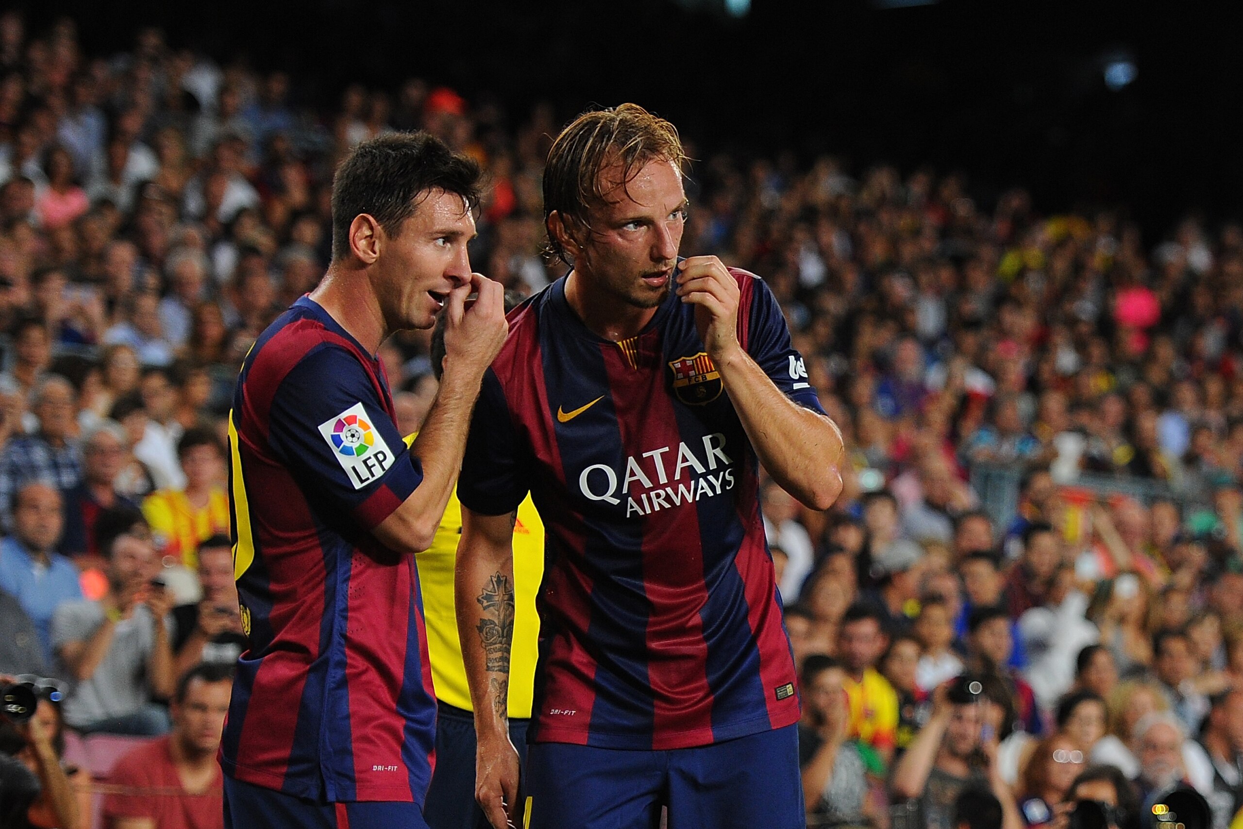 BARCELONA, SPAIN - AUGUST 24: Ivan Rakitic (R) of FC Barcelona consults with Lionel Messi before taking a free kick during the La Liga match between FC Barcelona and Elche FC at Camp Nou stadium on August 24, 2014 in Barcelona, Spain. (Photo by Denis Doyle/Getty Images) BARCELONA, SPAIN - AUGUST 24: Ivan Rakitic (R) of FC Barcelona consults with Lionel Messi before taking a free kick during the La Liga match between FC Barcelona and Elche FC at Camp Nou stadium on August 24, 2014 in Barcelona, Spain. (Photo by Denis Doyle/Getty Images)