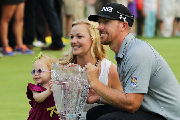 PARAMUS, NJ - AUGUST 24:  Hunter Mahan celebrates with his wife Kandi, daughter Zoe and the tournament trophy after winning of The Barclays at The Ridgewood Country Club on August 24, 2014 in Paramus, New Jersey.  (Photo by Hunter Martin/Getty Images)