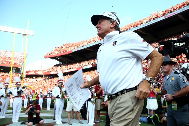 COLUMBIA, SC - AUGUST 29:  Head coach Steve Spurrier of the South Carolina Gamecocks runs onto the field against the North Carolina Tar Heels before their game at Williams-Brice Stadium on August 29, 2013 in Columbia, South Carolina.  (Photo by Streeter Lecka/Getty Images)
