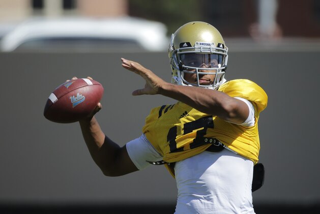 UCLA quarterback Brett Hundley throws a pass during NCAA college football practice Wednesday, Aug. 20, 2014, in Los Angeles. (AP Photo/Jae C. Hong)