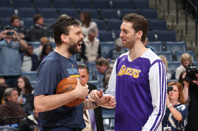 MEMPHIS, TN - FEBRUARY 26: Marc Gasol #33 of the Memphis Grizzlies laughs with brother Pau Gasol #16 of the Los Angeles Lakers on February 26, 2014 at FedExForum in Memphis, Tennessee. NOTE TO USER: User expressly acknowledges and agrees that, by downloading and or using this photograph, User is consenting to the terms and conditions of the Getty Images License Agreement. Mandatory Copyright Notice: Copyright 2014 NBAE (Photo by Joe Murphy/NBAE via Getty Images)