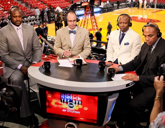 MIAMI, FL - MAY 24: TNT analysts, from left, Shaquille O'Neal, Ernie Johnson Jr., Kenny Smith and Charles Barkley speak after the Indiana Pacers defeated the Miami Heat in Game Two of the Eastern Conference Finals during the 2013 NBA Playoffs on May 24, 2013 at American Airlines Arena in Miami, Florida. NOTE TO USER: User expressly acknowledges and agrees that, by downloading and/or using this photograph, user is consenting to the terms and conditions of the Getty Images License Agreement. Mandatory copyright notice: Copyright NBAE 2013 (Photo by Issac Baldizon/NBAE via Getty Images)