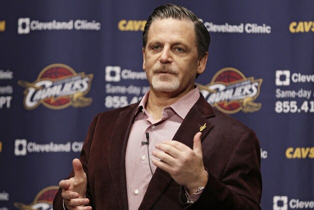 Cleveland Cavaliers owner Dan Gilbert answers questions before the Cavaliers' NBA basketball game against the Brooklyn Nets on Wednesday, Oct. 30, 2013, in Cleveland. (AP Photo/Tony Dejak)