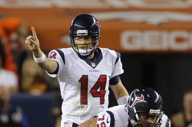 Houston Texans quarterback Ryan Fitzpatrick (14) makes a call against the Denver Broncos during the first half of an NFL preseason football game, Saturday, Aug. 23, 2014, in Denver. (AP Photo/Joe Mahoney)
