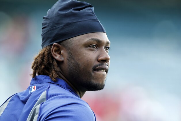 Los Angeles Dodgers’ Hanley Ramirez watches batting practice during warm ups for a baseball game against the Los Angeles Angels on Thursday, Aug. 7, 2014, in Anaheim, Calif. (AP Photo/Alex Gallardo)