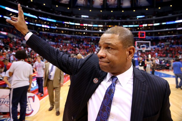 LOS ANGELES, CA - MAY 15:  Head coach Doc Rivers of the Los Angeles Clippers waves to fans after the Clippers were eliminated by the Oklahoma City Thunder in Game Six of the Western Conference Semifinals during the 2014 NBA Playoffs at Staples Center on May 15, 2014 in Los Angeles, California.  The Thunder won 10-98 win the series four games to two.  NOTE TO USER: User expressly acknowledges and agrees that, by downloading and or using this photograph, User is consenting to the terms and conditions of the Getty Images License Agreement.  (Photo by Stephen Dunn/Getty Images)