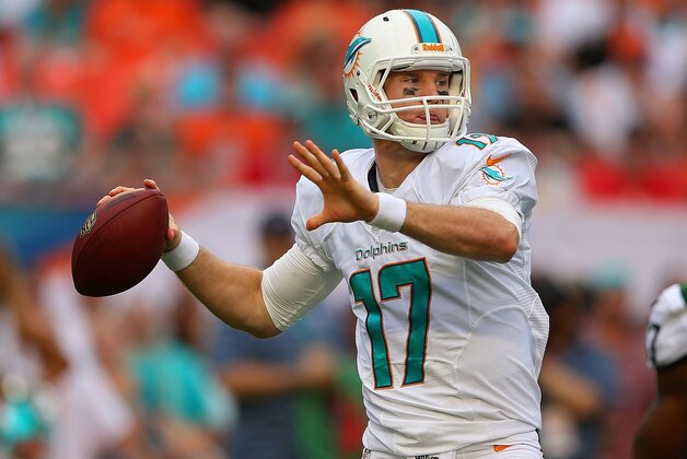 MIAMI GARDENS, FL - DECEMBER 29:  Ryan Tannehill #17 of the Miami Dolphins passes during a game against the New York Jets at Sun Life Stadium on December 29, 2013 in Miami Gardens, Florida.  (Photo by Mike Ehrmann/Getty Images)