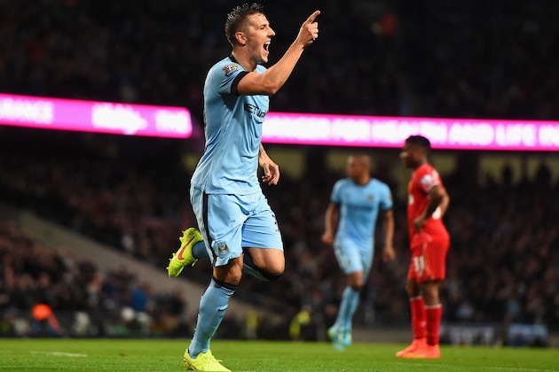 MANCHESTER, ENGLAND - AUGUST 25:  Stevan Jovetic of Manchester City celebrates scoring the opening goal during the Barclays Premier League match between Manchester City and Liverpool at the Etihad Stadium on August 25, 2014 in Manchester, England.  (Photo by Laurence Griffiths/Getty Images)