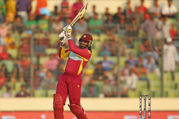 DHAKA, BANGLADESH - MARCH 28:  Chris Gayle of the West Indies hits a boundary during the ICC World Twenty20 Bangladesh 2014 match between Australia and the West Indies at Sher-e-Bangla Mirpur Stadium on March 28, 2014 in Dhaka, Bangladesh.  (Photo by Scott Barbour/Getty Images)