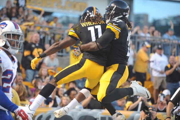 Pittsburgh Steelers wide receiver Markus Wheaton (11) and running back LeGarrette Blount (27) celebrate after Wheaton made a touchdown catch in the first quarter of the NFL football preseason game against the Buffalo Bills on Saturday, Aug. 16, 2014 in Pittsburgh. (AP Photo/Vincent Pugliese)