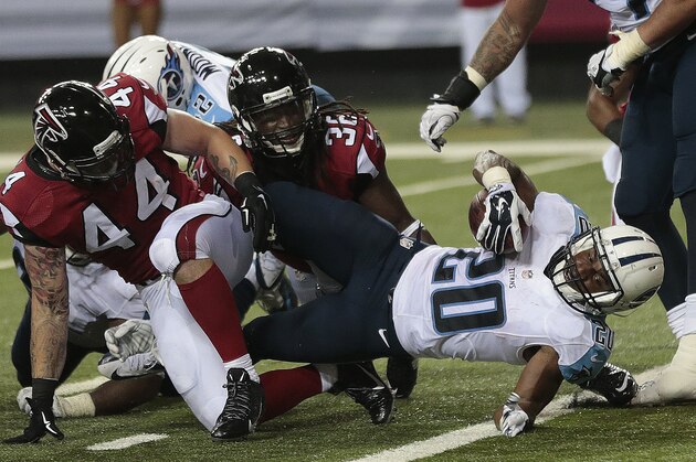 Tennessee Titans running back Bishop Sankey (20) scores a touchdown against the Atlanta Falcons during the second half of an NFL preseason football game, Saturday, Aug. 23, 2014, in Atlanta. (AP Photo/John Bazemore)