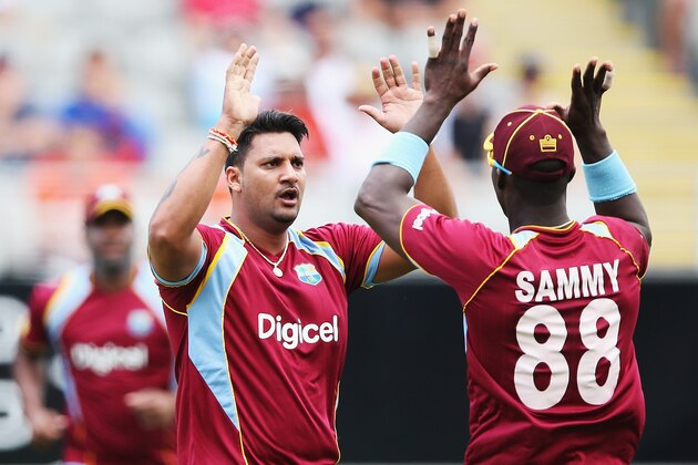 AUCKLAND, NEW ZEALAND - DECEMBER 26:  Ravi Rampaul of the West Indies celebrates the wicket of Martin Guptill of New Zealand during the first One Day International match between New Zealand and the West Indies at Eden Park on December 26, 2013 in Auckland, New Zealand.  (Photo by Hannah Peters/Getty Images)