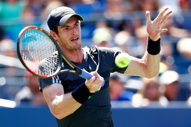 NEW YORK, NY - AUGUST 25: Andy Murray of Great Britain returns a shot against Robin Haase of the Netherlands during his men's singles first round match on Day One of the 2014 US Open at the USTA Billie Jean King National Tennis Center on August 25, 2014 in the Flushing neighborhood of the Queens borough of New York City. (Photo by Julian Finney/Getty Images) NEW YORK, NY - AUGUST 25: Andy Murray of Great Britain returns a shot against Robin Haase of the Netherlands during his men's singles first round match on Day One of the 2014 US Open at the USTA Billie Jean King National Tennis Center on August 25, 2014 in the Flushing neighborhood of the Queens borough of New York City. (Photo by Julian Finney/Getty Images)