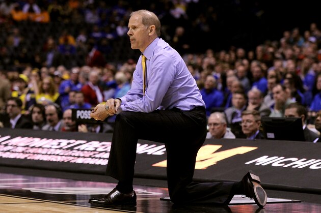 INDIANAPOLIS, IN - MARCH 28:  Head coach John Beilein of the Michigan Wolverines shouts to his team in the first half against the Tennessee Volunteers during the regional semifinal of the 2014 NCAA Men's Basketball Tournament at Lucas Oil Stadium on March 28, 2014 in Indianapolis, Indiana.  (Photo by Andy Lyons/Getty Images)