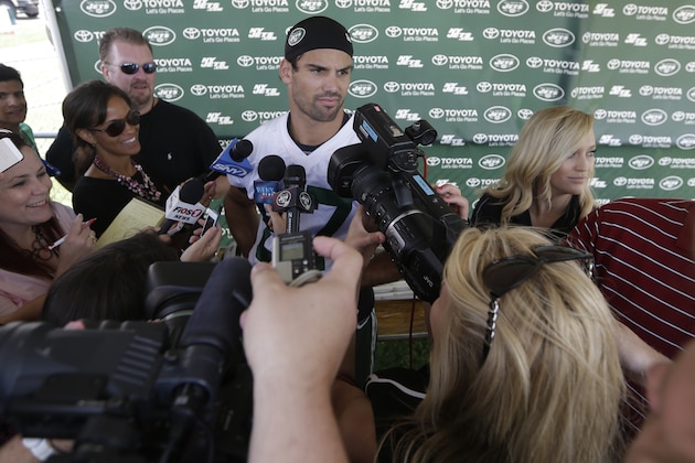 New York Jets wide receiver Eric Decker (87) responds to questions after practice during NFL football training camp Thursday, July 24, 2014, in Cortland, N.Y.  (AP Photo)