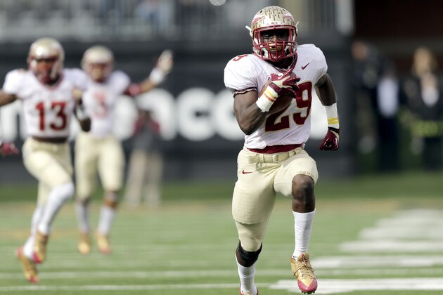 Florida State defensive back Nate Andrews (29) runs back an interception for a touchdown against Wake Forest in the first half of an NCAA college football game in Winston-Salem, N.C., Saturday, Nov. 9, 2013. (AP Photo/Nell Redmond)