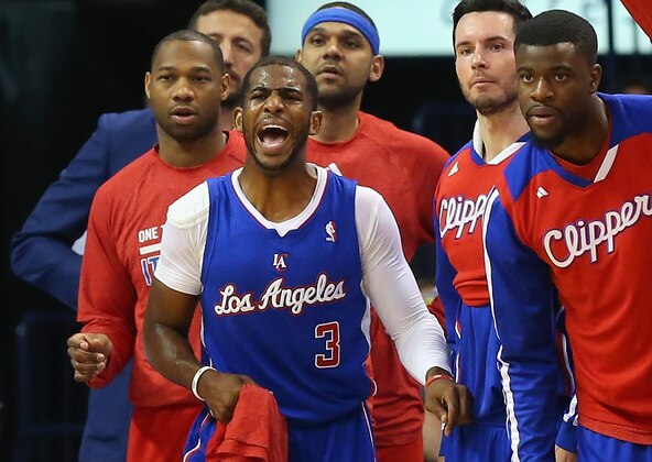 OKLAHOMA CITY, OK - MAY 13:  Chris Paul #3 of the Los Angeles Clippers reacts on the bench against the Oklahoma City Thunder in Game Five of the Western Conference Semifinals during the 2014 NBA Playoffs at Chesapeake Energy Arena on May 13, 2014 in Oklahoma City, Oklahoma. NOTE TO USER: User expressly acknowledges and agrees that, by downloading and or using this photograph, User is consenting to the terms and conditions of the Getty Images License Agreement.  (Photo by Ronald Martinez/Getty Images)