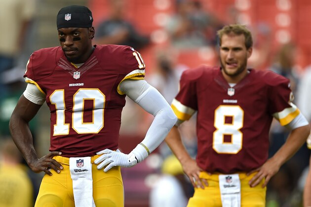 LANDOVER, MD - AUGUST 07: Quarterback Robert Griffin III #10, quarterback Kirk Cousins #8, and quarterback Colt McCoy #16 of the Washington Redskins look on before playing the New England Patriots during their preseason NFL game at FedExField on August 7, 2014 in Landover, Maryland. (Photo by Patrick Smith/Getty Images) LANDOVER, MD - AUGUST 07: Quarterback Robert Griffin III #10, quarterback Kirk Cousins #8, and quarterback Colt McCoy #16 of the Washington Redskins look on before playing the New England Patriots during their preseason NFL game at FedExField on August 7, 2014 in Landover, Maryland. (Photo by Patrick Smith/Getty Images)