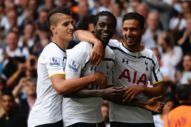 LONDON, ENGLAND - AUGUST 24: Emmanuel Adebayor of Spurs celebrates his goal with team mates during the Barclays Premier League match between Tottenham Hotspur and Queens Park Rangers at White Hart Lane on August 24, 2014 in London, England. (Photo by Jamie McDonald/Getty Images) LONDON, ENGLAND - AUGUST 24: Emmanuel Adebayor of Spurs celebrates his goal with team mates during the Barclays Premier League match between Tottenham Hotspur and Queens Park Rangers at White Hart Lane on August 24, 2014 in London, England. (Photo by Jamie McDonald/Getty Images)