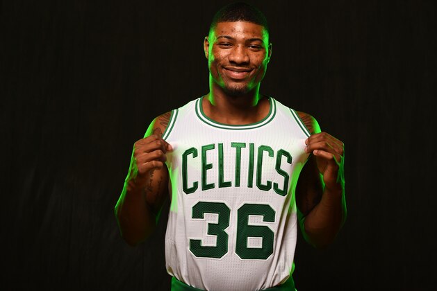 TARRYTOWN, NY - AUGUST 3:  Marcus Smart #36 of the Boston Celtics poses for a portrait during the 2014 NBA rookie photo shoot on August 3, 2014 at the Madison Square Garden Training Facility in Tarrytown, New York. NOTE TO USER: User expressly acknowledges and agrees that, by downloading and or using this photograph, User is consenting to the terms and conditions of the Getty Images License Agreement. Mandatory Copyright Notice: Copyright 2014 NBAE (Photo by Brian Babineau /NBAE via Getty Images)