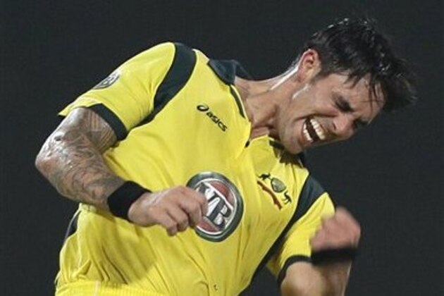 Australia’s Mitchell Johnson celebrates taking the wicket of Pakistan's Nasir Jamshed, not pictured, during the third cricket ODI match of a three match series between Australia and Pakistan, at Sharjah Cricket Stadium, in Sharjah, United Arab Emirates, Monday, Sept. 3, 2012. (AP Photo/Hassan Ammar)